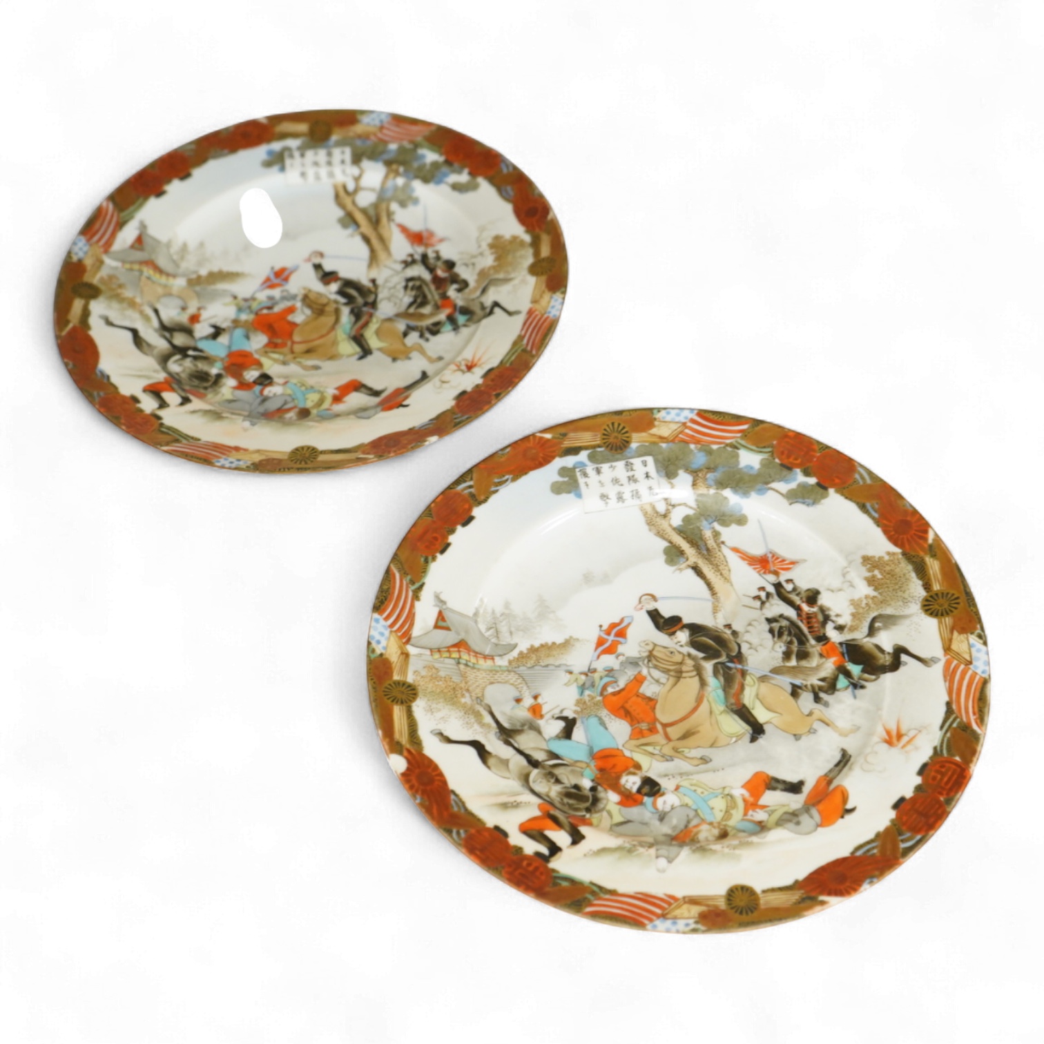 Two unusual Russo-Japanese war subject Kutani plates, c.1906, 21.5cm diameter